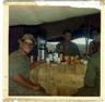 Posted by Dick on 5/29/2003, 22KB
Me enjoying Jum surbers bartending and a couple Army dudes.  The Army LT gave the platoon 3 jugs a week to keep him looki