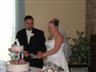 Posted by cat-rn76 on 7/31/2007, 20KB
Brian and Vicki cutting cake...so cute