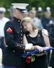 Posted by USAPatriot_Wizard on 8/11/2005, 68KB
Marine Eric Montgomery (L) and Brian Montgomery's wife, Pamela, greave during Brian's funeral service at the Western Rese