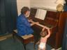 Posted by Μacca on 3/30/2007, 37KB
Nana (my MIL) teaching Samuel how to play the piano.