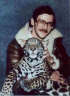 Posted by Shadowman on 12/21/2000, 37KB
Asia, with an unexpectedly playful white tiger cub!