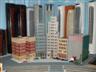 Posted by Scissorlift1 on 6/9/2008, 62KB
New additions to corner of City. Total of 18 skyscrapers. All from WM. Can you figure out what they are made out of?