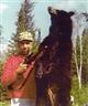 Posted by SeaworthyBwana on 8/30/2004, 62KB
This bear  was jumping at me. One shot from my Winchester Model 100, 150 gr  got him in the side through the heart and lu