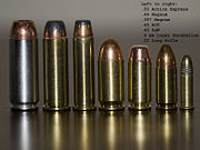 From left to right: .50 Action Express, .44 Magnum, .357 Magnum, .45 ACP, .40 S&W, 9mm Parabellum, .22 Long Rifle.